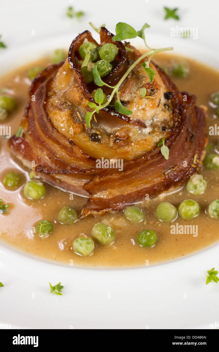 Baked Chicken Wrapped w Bacon n Ham Stock Photo