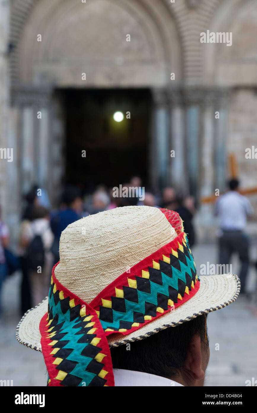 Pilgrim wearing a South American hat. Holy Sepulcher courtyard. Jerusalem Old City. Israel. Stock Photo