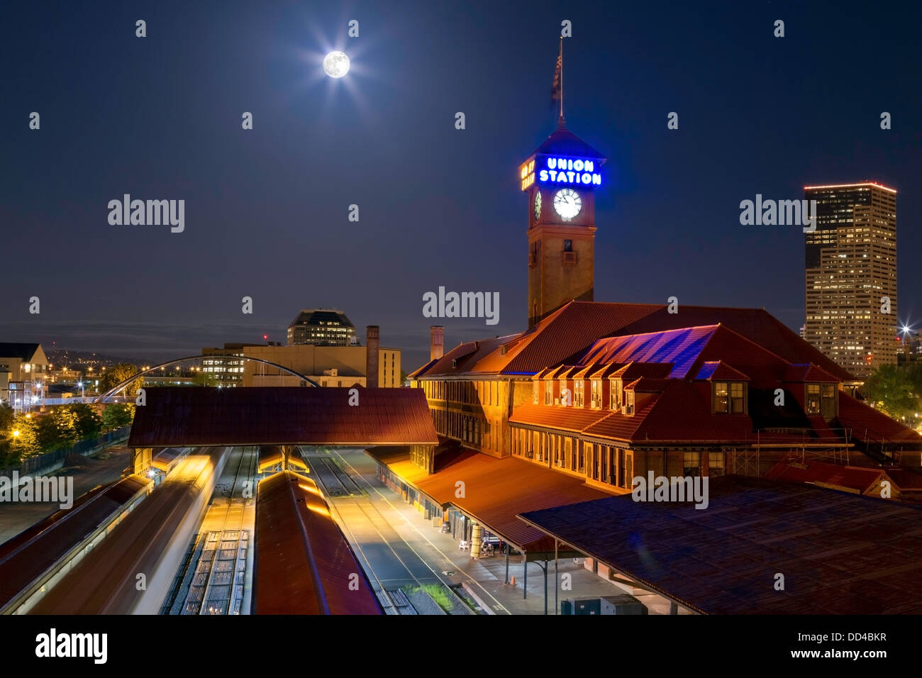 Union Train Station in Portland, Oregon with a Full Moon Above Stock Photo