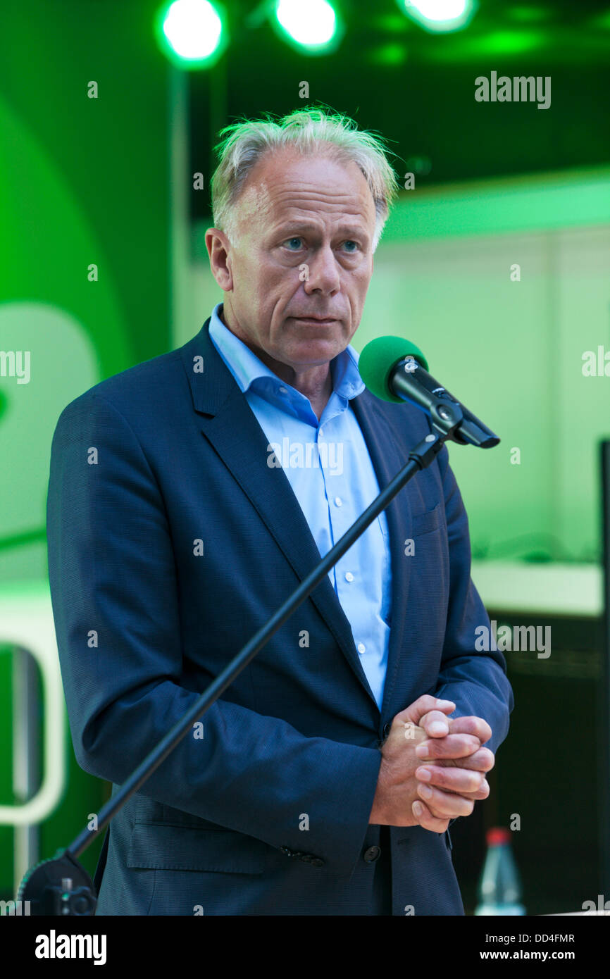 Lüneburg - Germany, August 24th, 2013: Jürgen Trittin, prime candidate of Bündnis 90/Die Grünen and former Federal Minister for the Environment, Nature Conservation and Nuclear Safety speaking at a pre-election party, looking astonished. Stock Photo