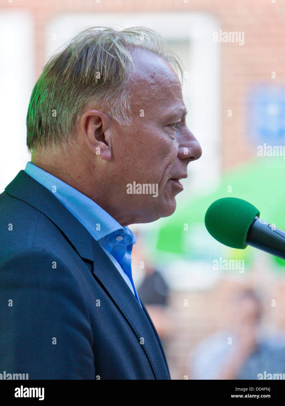 Lüneburg - Germany, August 24th, 2013: Jürgen Trittin, prime candidate of Bündnis 90/Die Grünen and former Federal Minister for the Environment, Nature Conservation and Nuclear Safety speaking at a pre-election party. Stock Photo