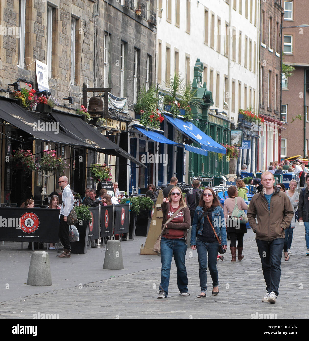 Pedestrians Walking Along Grassmarket, Edinburgh, Scotland, UK Stock Photo