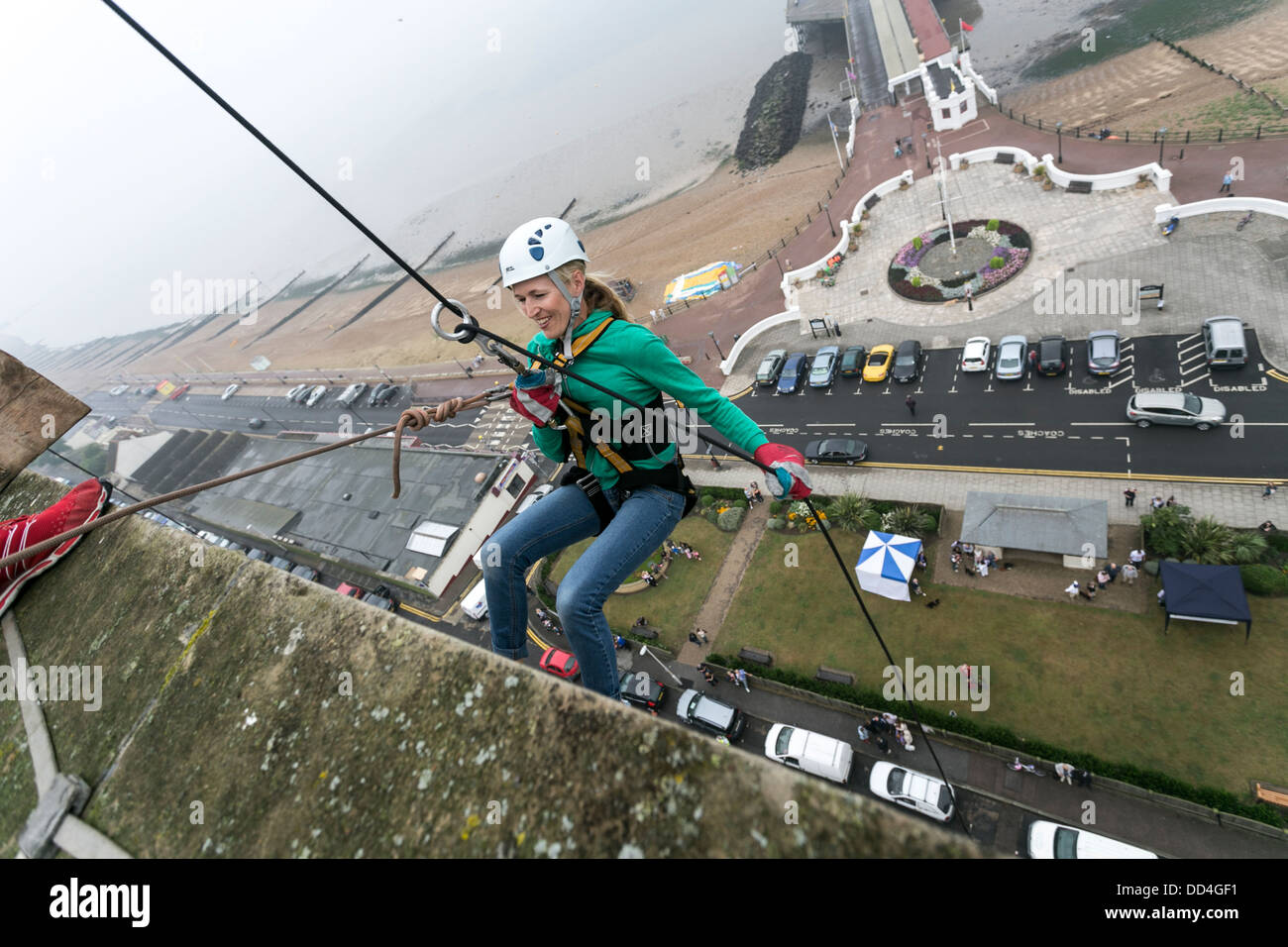 Person Absailing People Abseiling ofrom a tower block for charity Stock Photo - Alamy