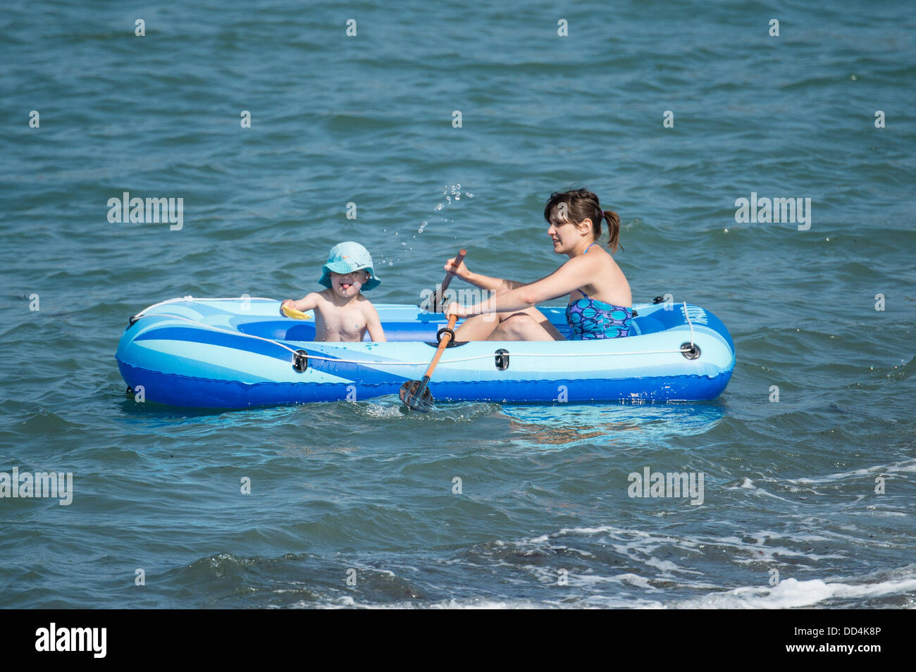 Aberystwyth, UK. 26th Aug, 2013. People enjoying the warm sunny weather on August Bank Holiday Monday at Aberystwyth, on the west Wales coast.  Credit:  keith morris/Alamy Live News Stock Photo