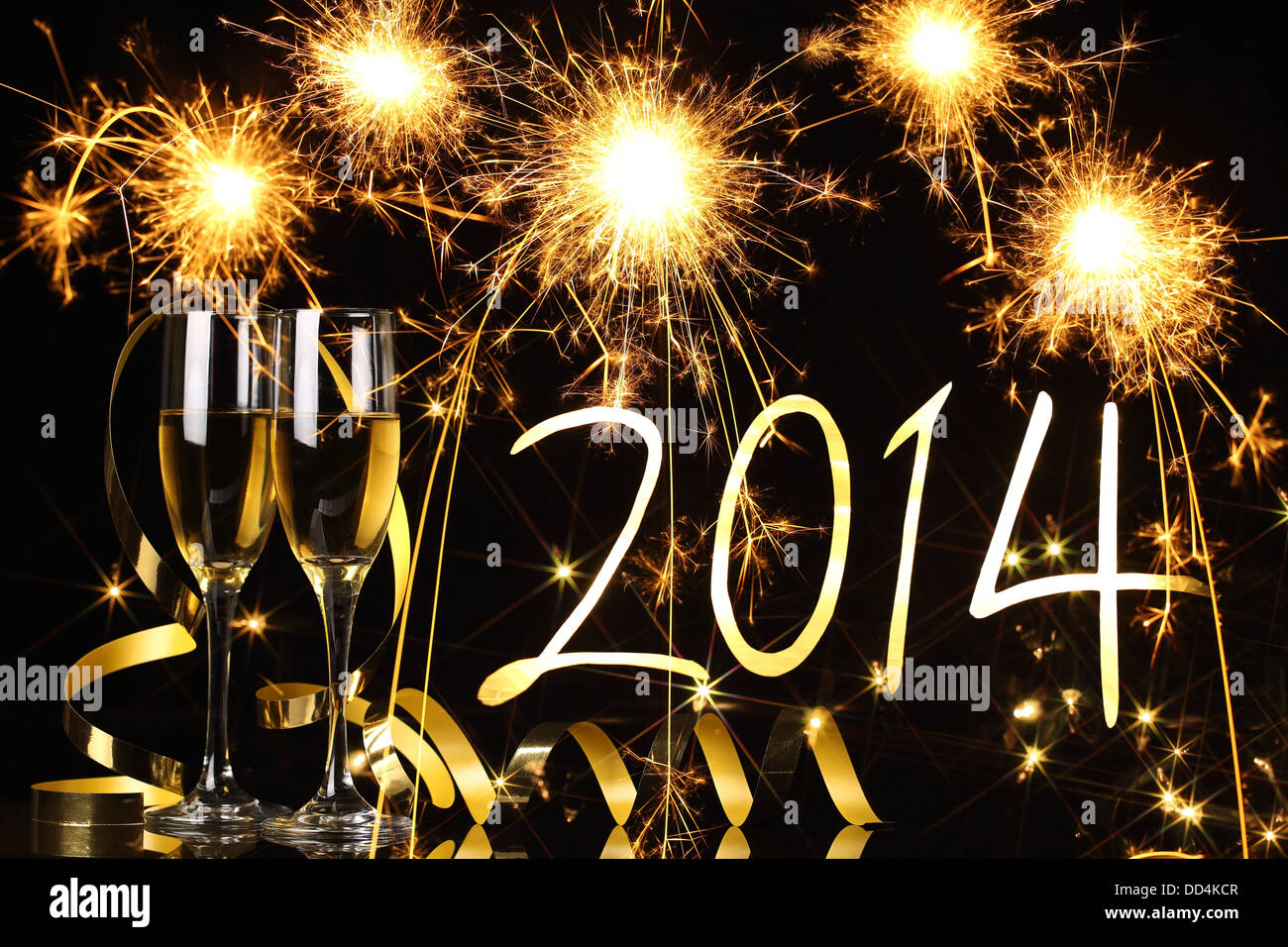 Glasses with champagne against fireworks,new year2014 Stock Photo