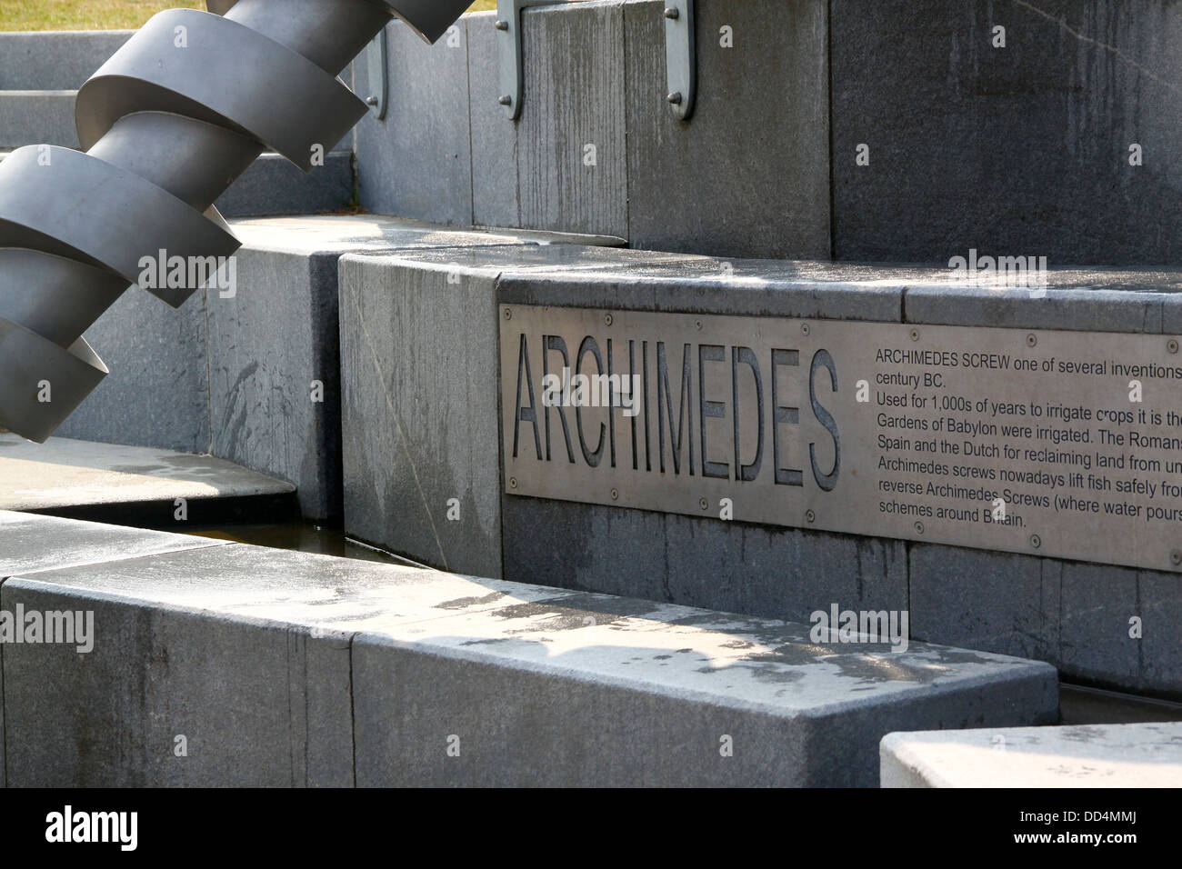 Archimedes screw and information sign Stock Photo