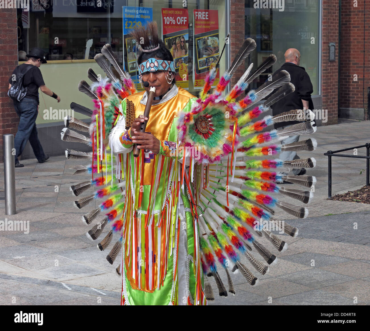 Peruvian South American buskers / entertainers in Warrington town centre , Cheshire , England , UK Stock Photo