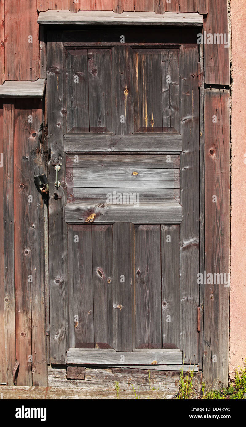 Old brown locked wooden door background texture Stock Photo
