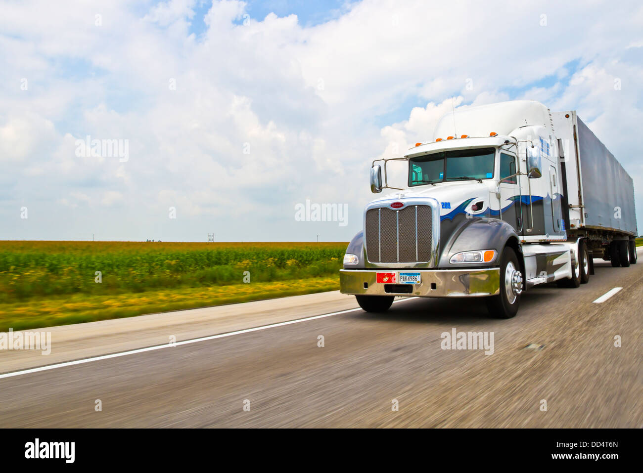 Semi truck on an interstate highway. Photographed in Indiana, USA Stock Photo