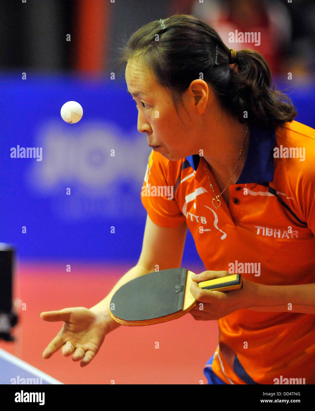 Linda Creemers and Li Jiao (pictured) from Netherlands in action during the finals of women's doubles against Katarzyna Grzybowska and Natalia Partykova of Poland during the World Tour tournament in Olomouc, Czech Republic, August 25, 2013. (CTK Photo/Ludek Perina) Stock Photo