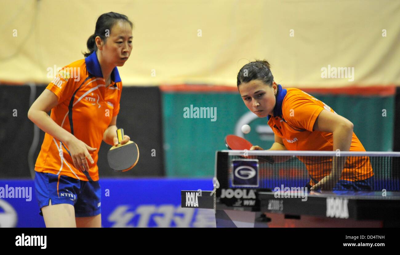 Linda Creemers (right) and Li Jiao (left) from Netherlands in action during the finals of women's doubles against Katarzyna Grzybowska and Natalia Partyka of Poland during the World Tour tournament in Olomouc, Czech Republic, August 25, 2013. (CTK Photo/Ludek Perina) Stock Photo