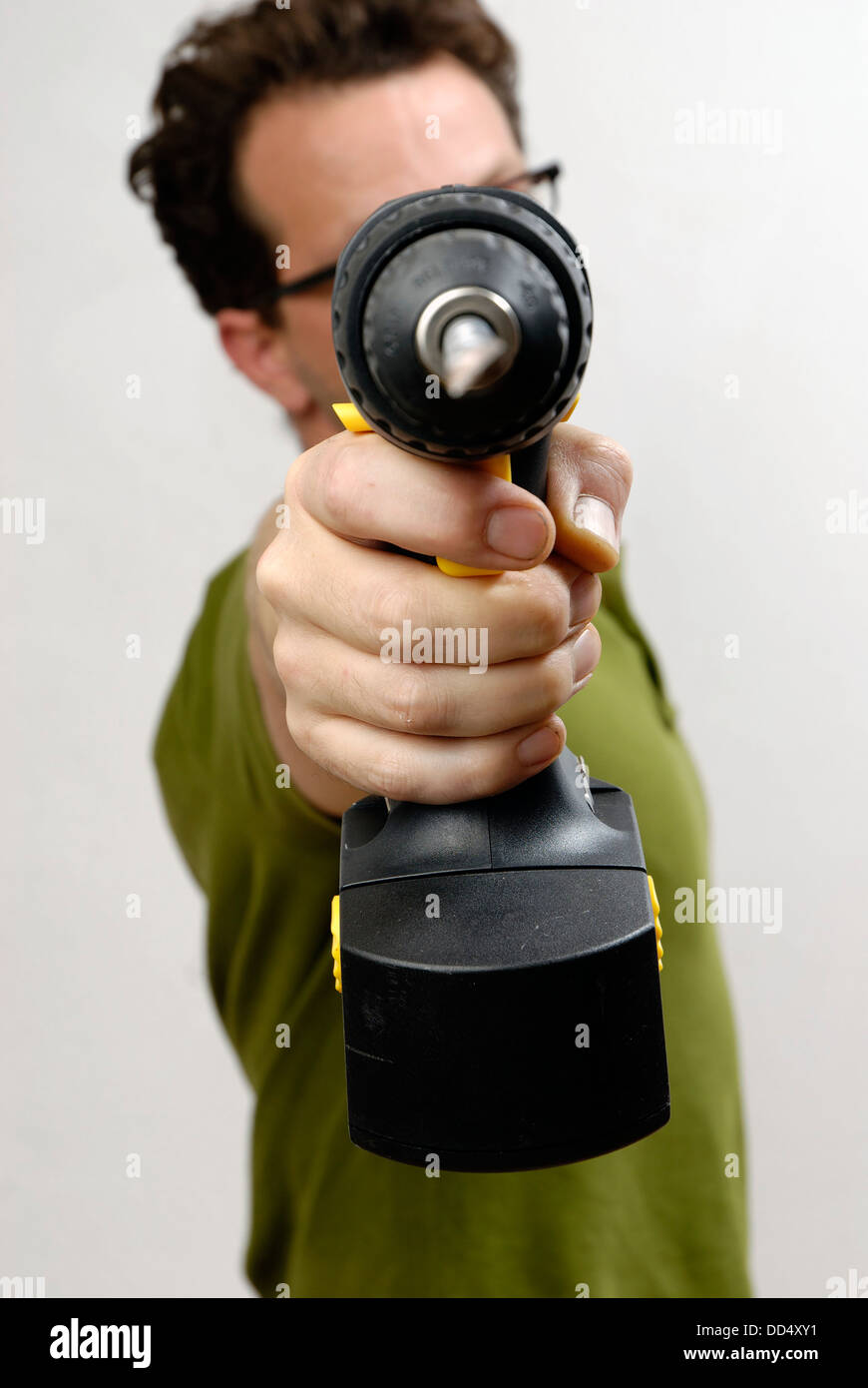 Man with screwdriver in dirty hand Stock Photo