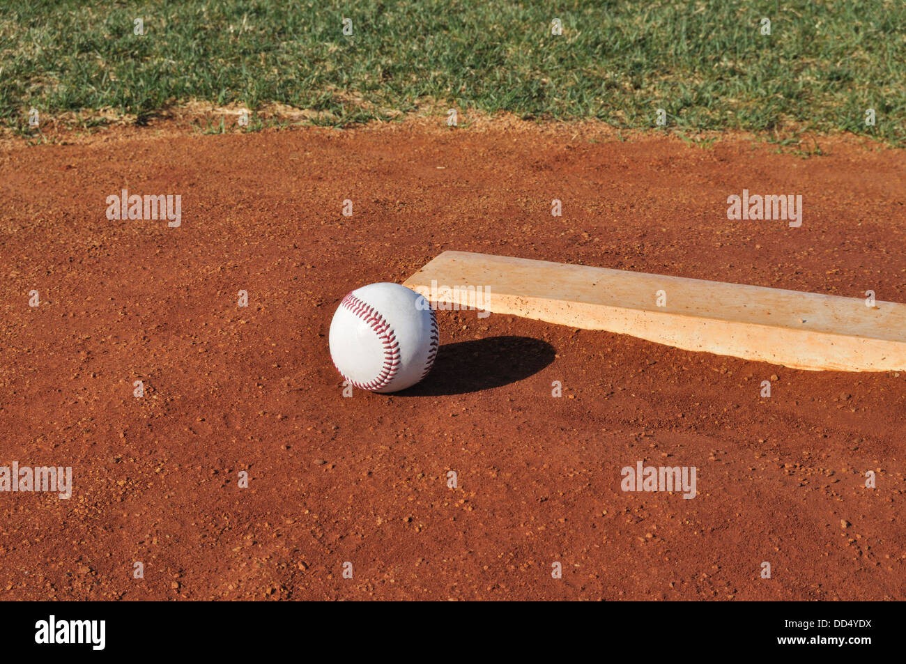 Baseball on the Pitcher's Mound Near the Pitching Rubber Stock Photo