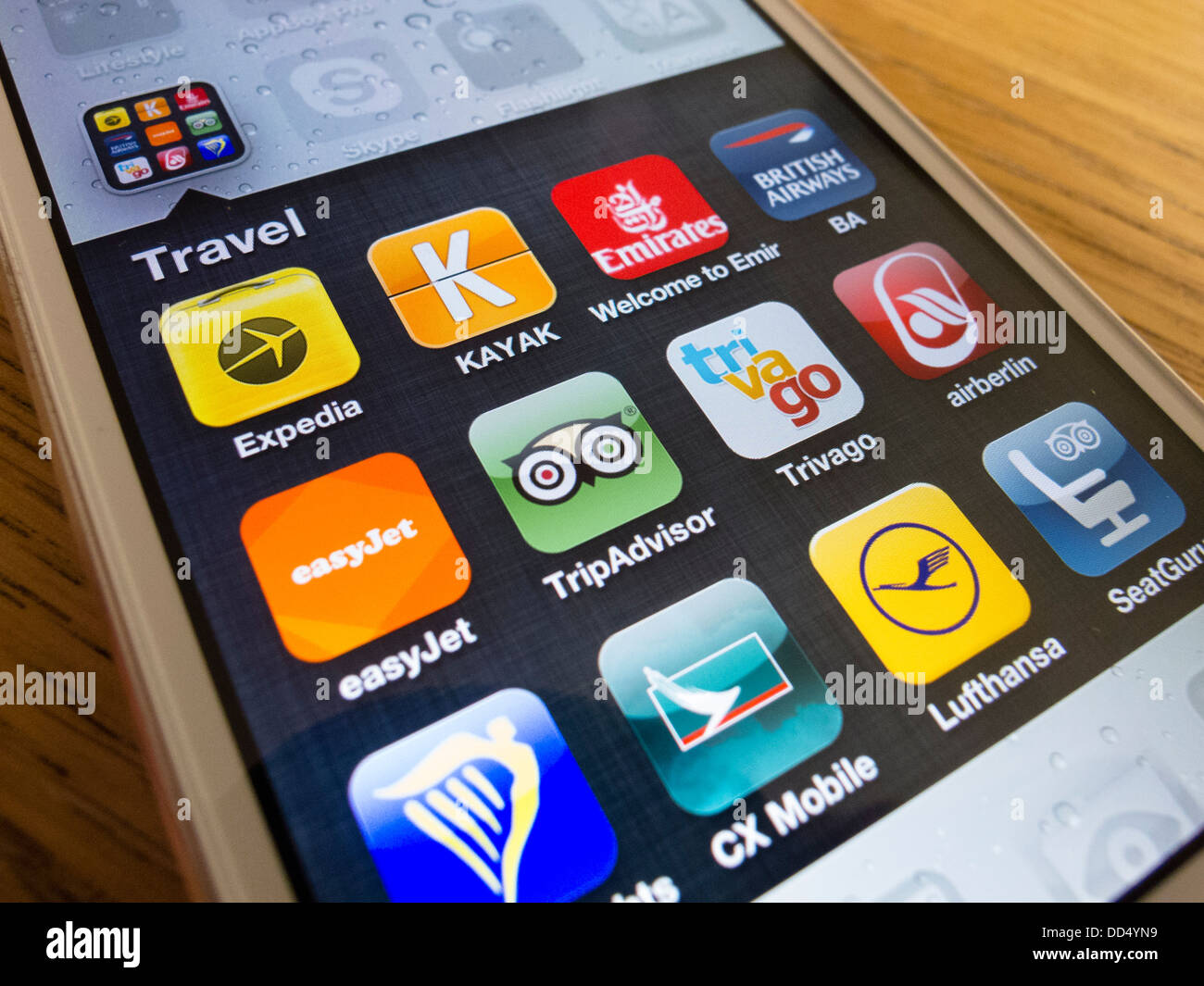 detail of many travel apps on an iPhone 5 smart phone Stock Photo