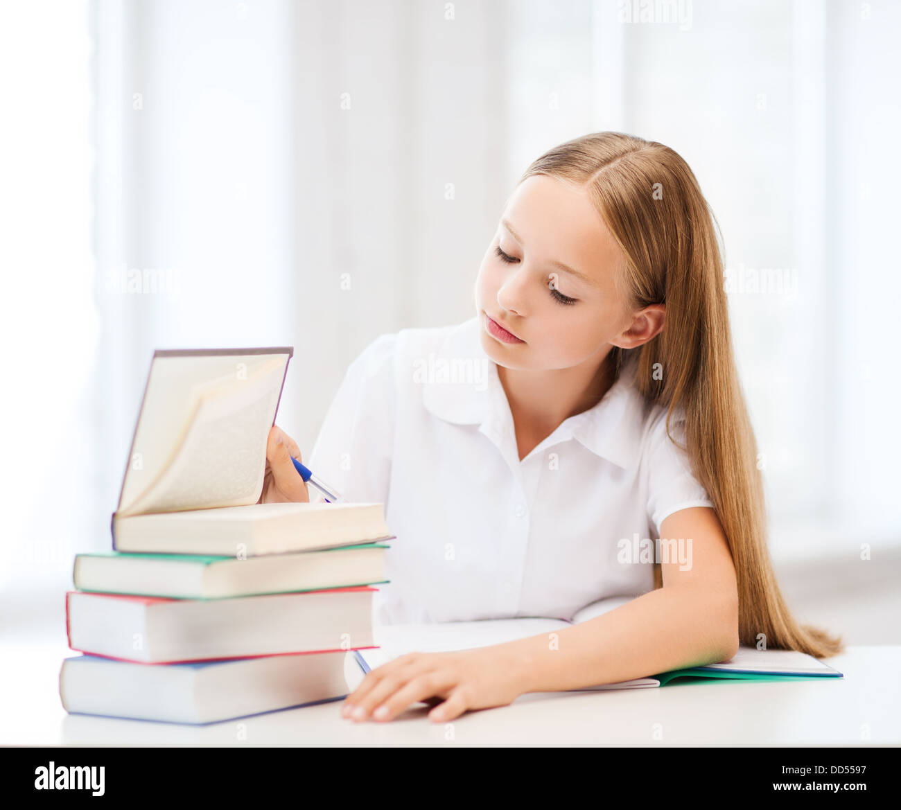 student girl studying at school Stock Photo - Alamy