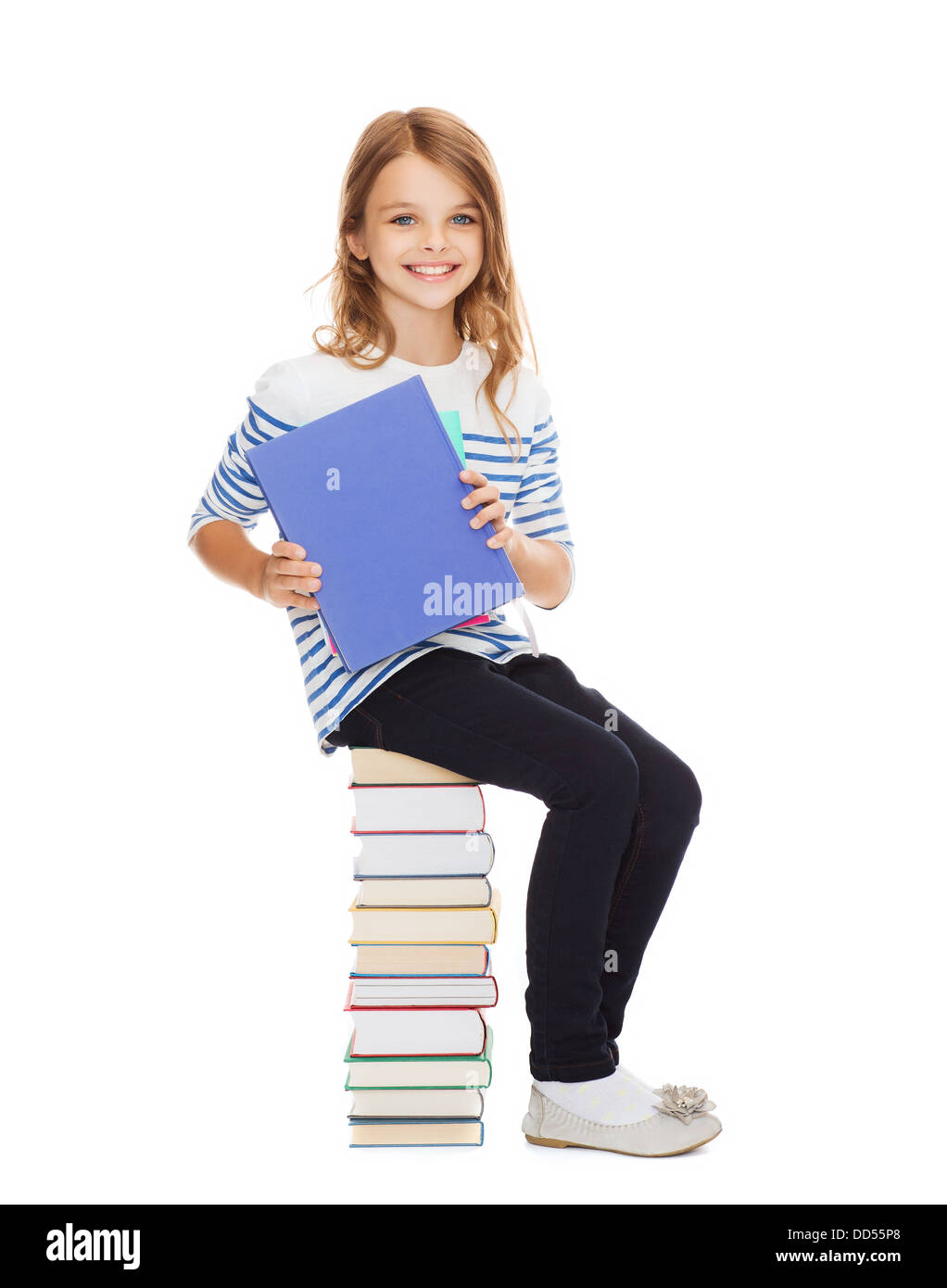little student girl sitting on stack of books Stock Photo - Alamy