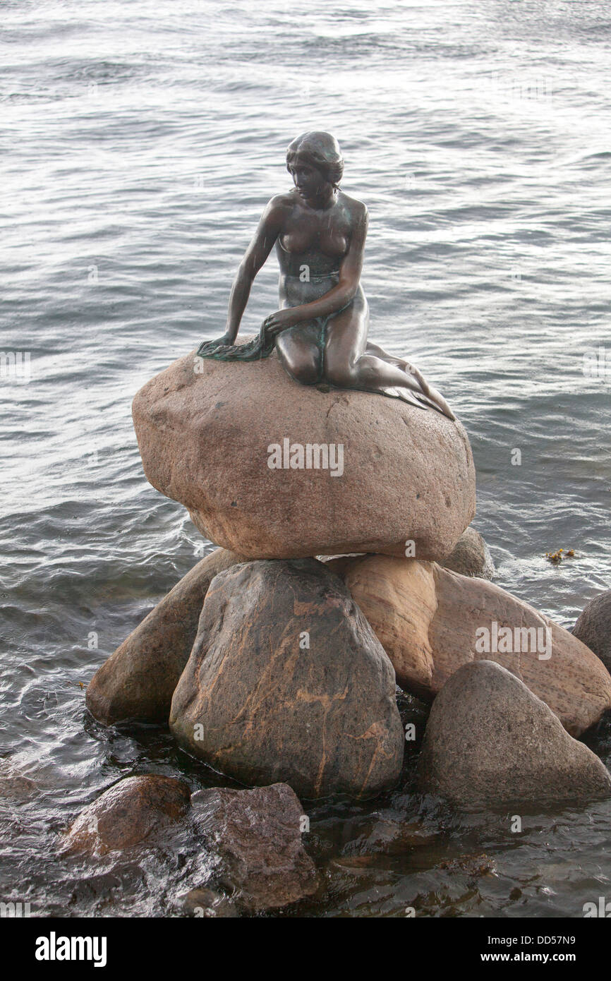 The Little Mermaid bronze statue, displayed on a rock by the waterside at the Langelinie promenade in Copenhagen, Denmark Stock Photo