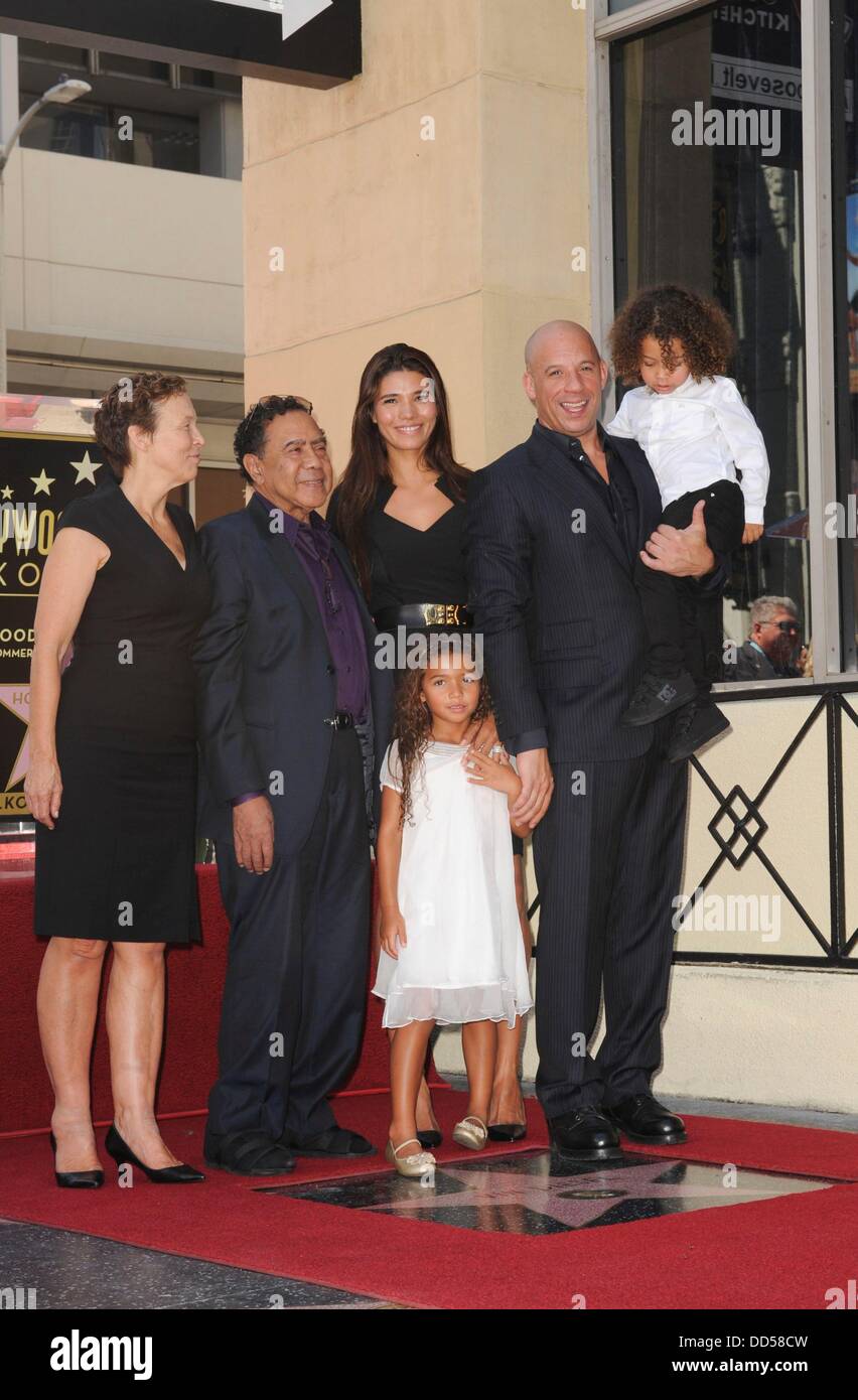 Los Angeles, CA. 26th Aug, 2013. Vin Diesel, mother Delora Vincent, father Irving Vincent, Paloma Jimenez, daughter Hania Riley, son at the induction ceremony for Star on the Hollywood Walk of Fame for Vin Diesel, Hollywood Boulevard, Los Angeles, CA August 26, 2013. Credit:  Elizabeth Goodenough/Everett Collection/Alamy Live News Stock Photo