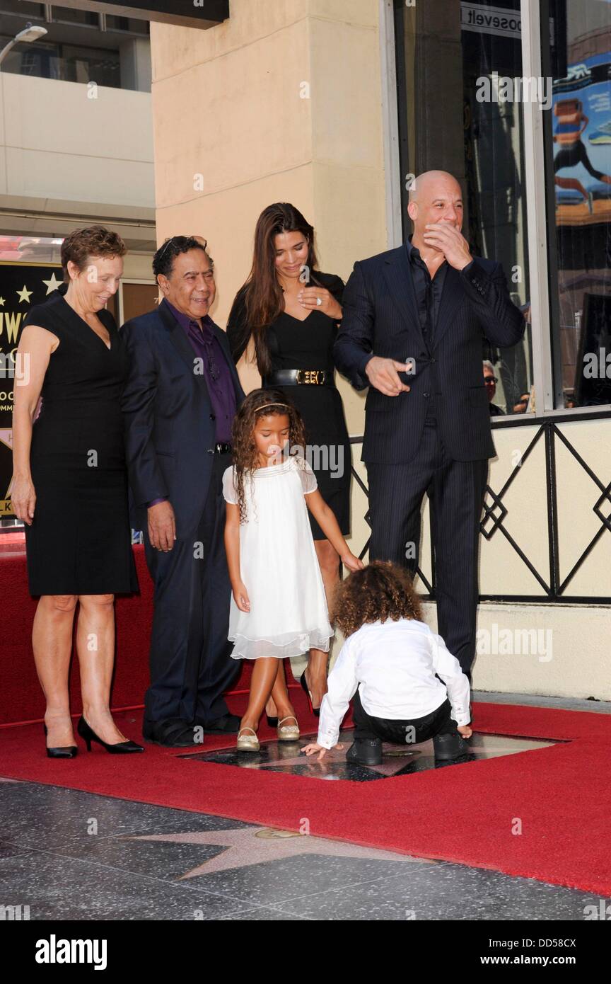 Los Angeles, CA. 26th Aug, 2013. Vin Diesel, mother Delora Vincent, father Irving Vincent, Paloma Jimenez, daughter Hania Riley, son at the induction ceremony for Star on the Hollywood Walk of Fame for Vin Diesel, Hollywood Boulevard, Los Angeles, CA August 26, 2013. Credit:  Elizabeth Goodenough/Everett Collection/Alamy Live News Stock Photo