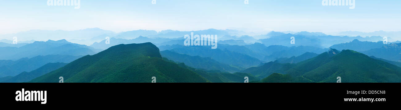 Mist mountain and valley landscape Stock Photo