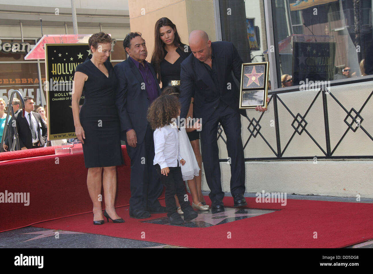 Hollywood, California, USA. 25th Aug, 2013. Vin Diesel Honored With Star On The Hollywood Walk Of Fame .Hollywood Blvd At Hollywood Roosevelt Hotel, Hollywood, CA.08/26/2013 .VIN DIESEL WITH PALOMA JIMINEZ AND CHILDREN - DELORA SHERLEEN VINCENT - MOTHER OF VIN DIESEL AND IRVING H. VINCENT - STEPFATHER OF VIN DIESEL . 2013 Credit:  Clinton Wallace/Globe Photos/ZUMAPRESS.com/Alamy Live News Stock Photo