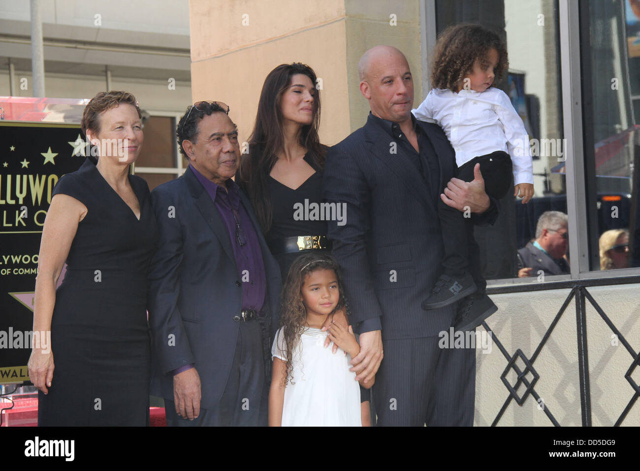 Hollywood, California, USA. 25th Aug, 2013. Vin Diesel Honored With Star On The Hollywood Walk Of Fame .Hollywood Blvd At Hollywood Roosevelt Hotel, Hollywood, CA.08/26/2013 .VIN DIESEL WITH PALOMA JIMINEZ AND CHILDREN - DELORA SHERLEEN VINCENT - MOTHER OF VIN DIESEL AND IRVING H. VINCENT - STEPFATHER OF VIN DIESEL . 2013 Credit:  Clinton Wallace/Globe Photos/ZUMAPRESS.com/Alamy Live News Stock Photo