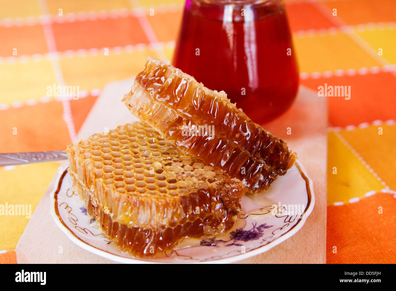 Honey jar and closeup full of honey Stock Photo Alamy
