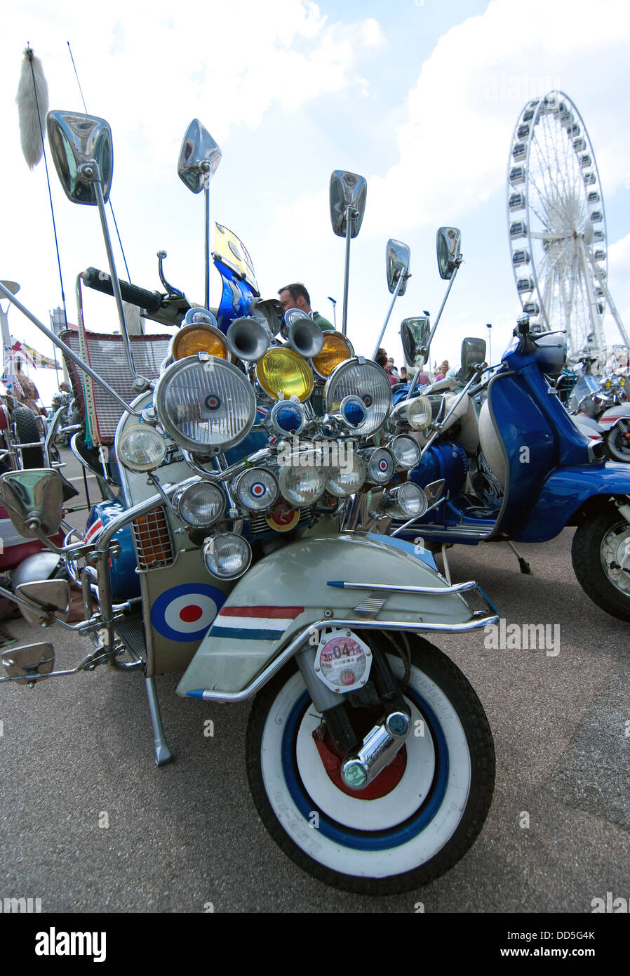 A classic scooter parked on Brighton Seafront during Mod Weekender. Stock Photo