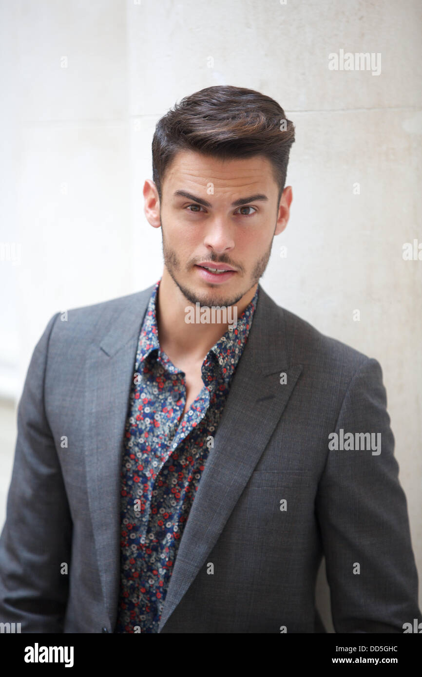 Model and musician Baptiste Giabiconi poses for photographs in Berlin, Germany, 27 August 2013. Photo: JOERG CARSTENSEN Stock Photo