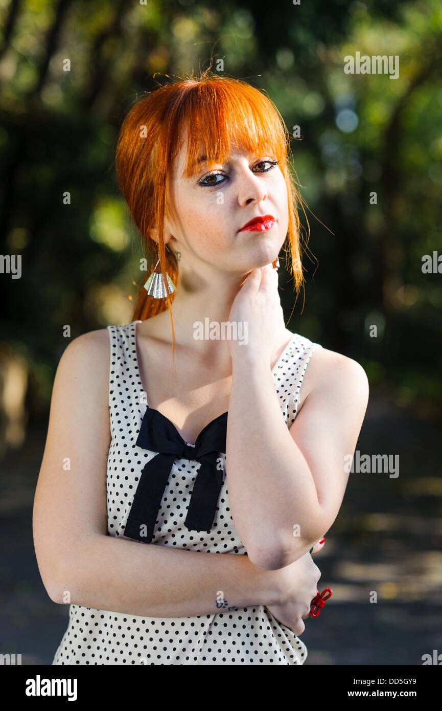 Girl touching neck hires stock photography and images Alamy