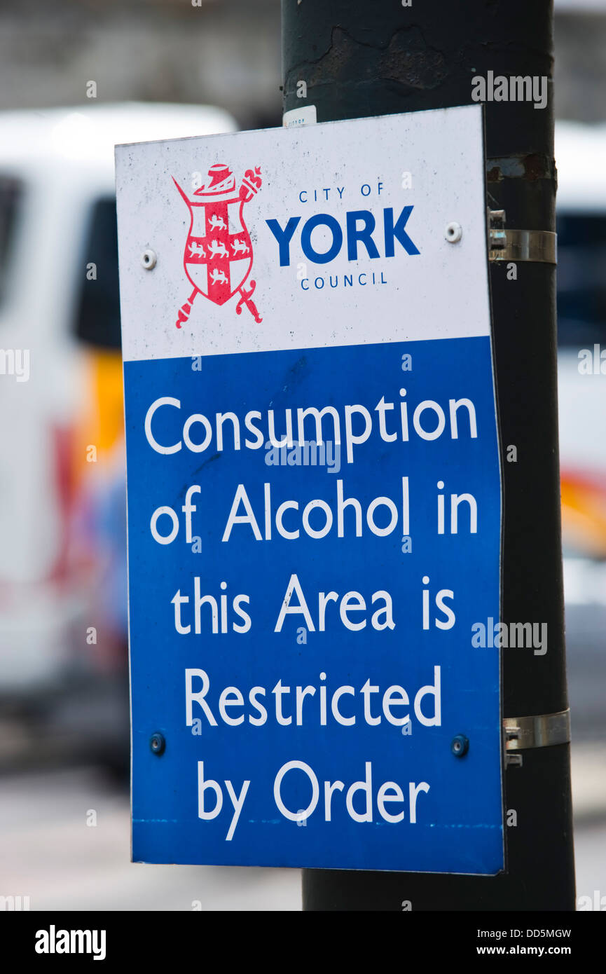 Alcohol restriction sign on street in city of York North Yorkshire England UK Stock Photo