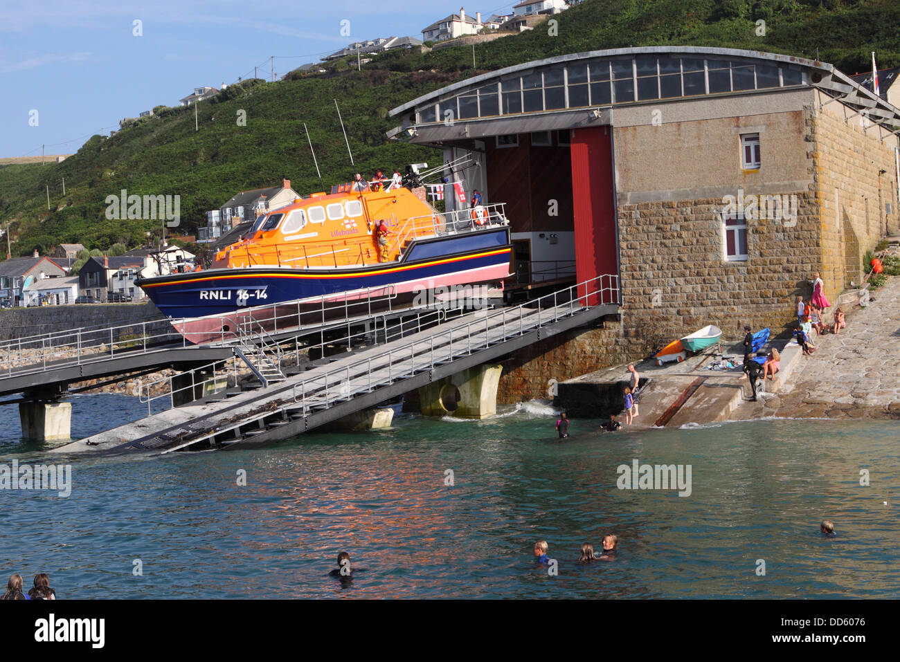 RNLI Tamar class lifeboat launching at Sennen Cove Cornwall in 2013 Stock Photo