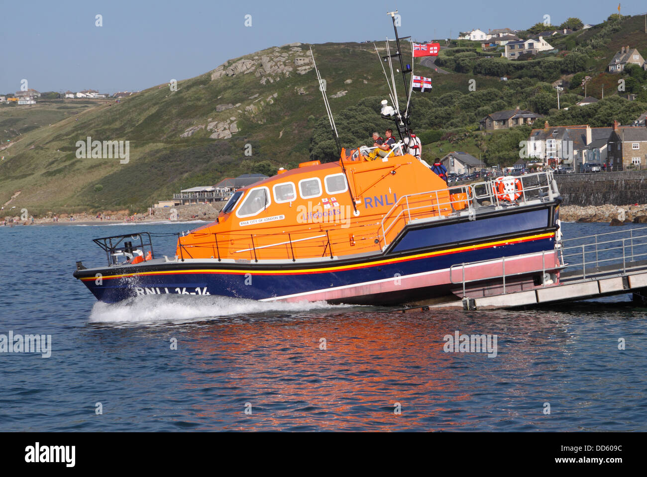 RNLI Tamar class lifeboat launching at Sennen Cove Cornwall in 2013 Stock Photo