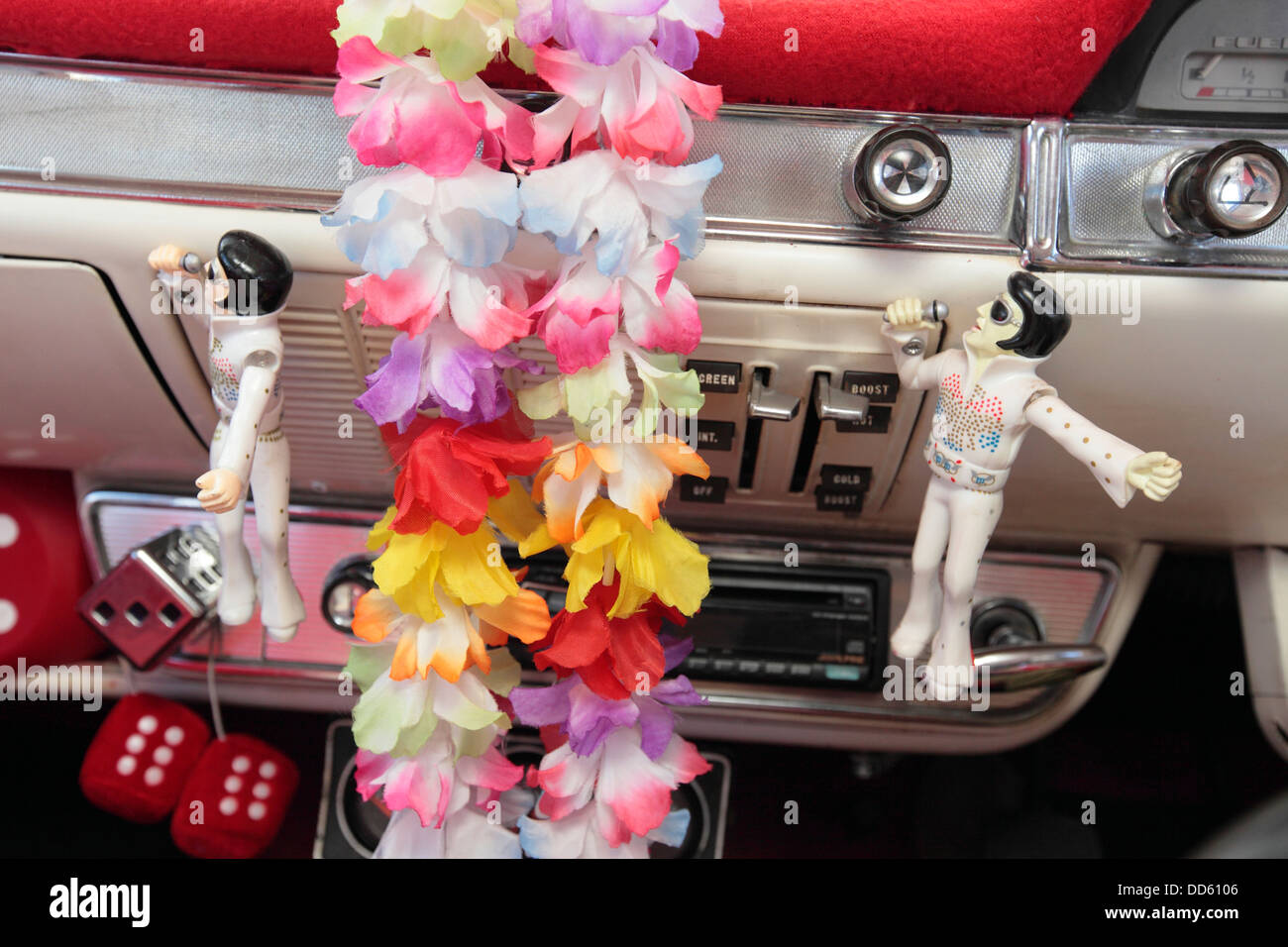 Interior classic Ford Consul, with kitsch Elvis figures, Suffolk, UK Stock Photo