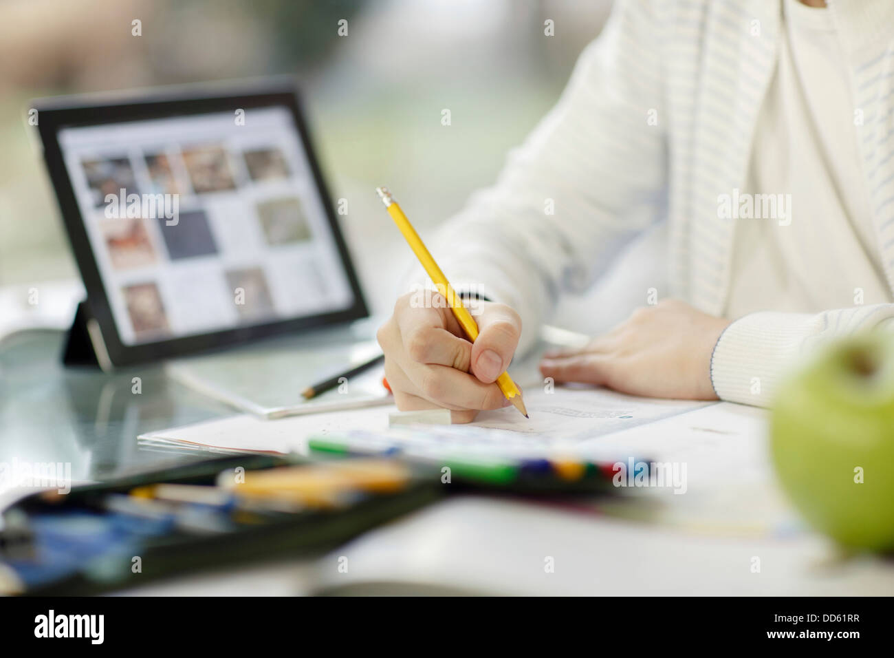 Boy using digital tablet and doing homework, Osijek, Croatia, Europe Stock Photo