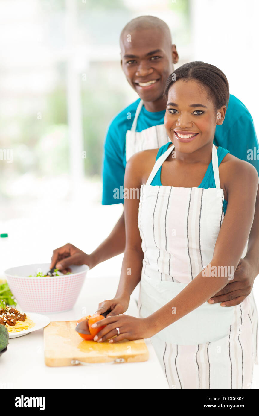 cute African American couple cooking healthy food together Stock Photo ...