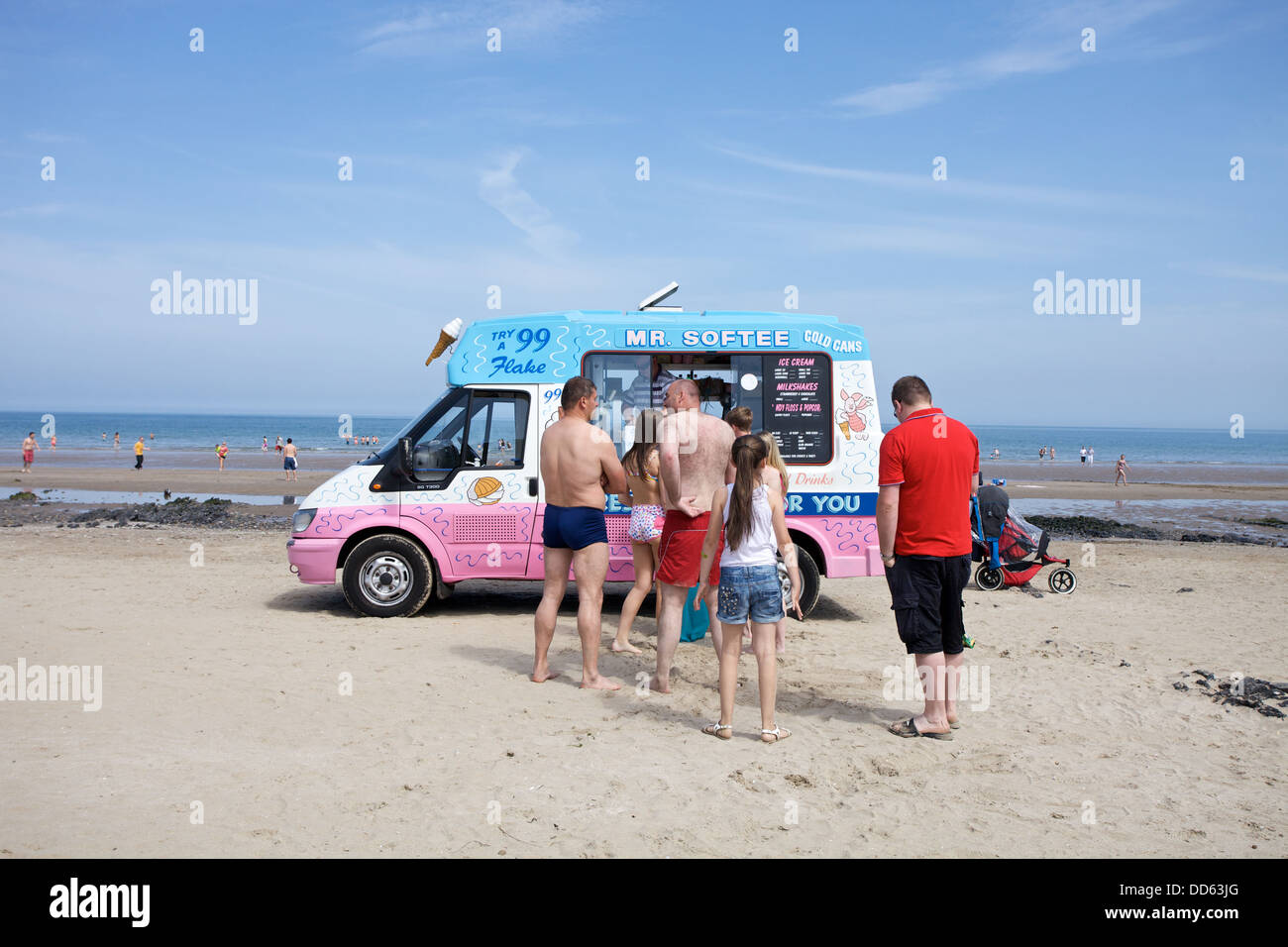 People queuing for an ice cream van at the seaside in Dublin city, Ireland. Stock Photo