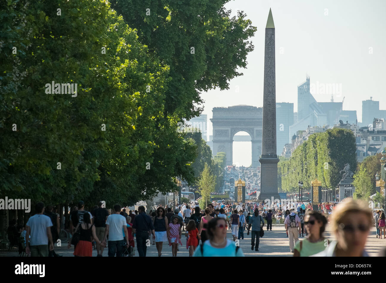 Crowds along the Champs Elysees, from the Place de la Concorde to the Arc de Triomphe in Paris, France. Stock Photo