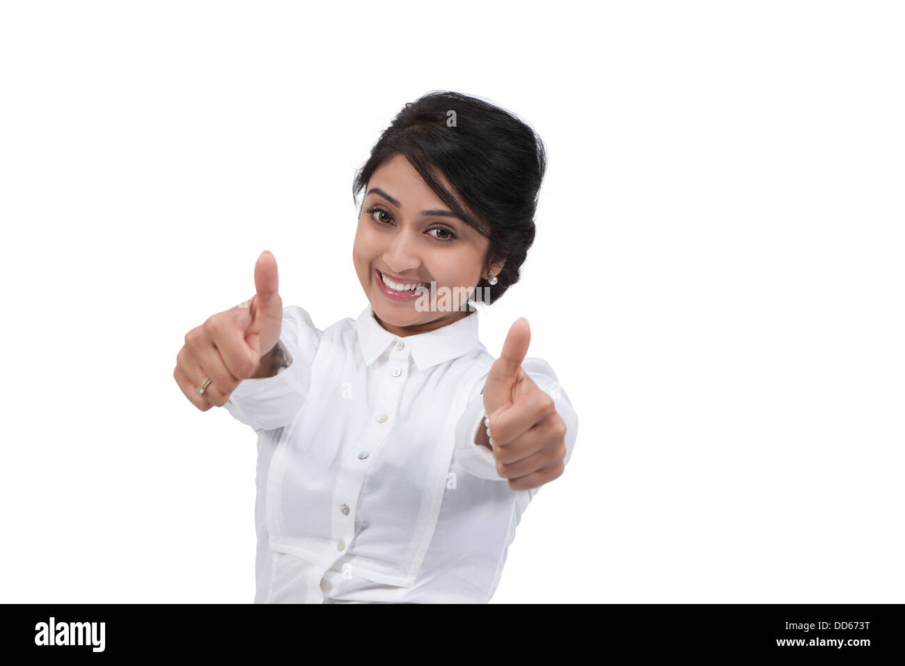Business woman showing thumbs up agreement Stock Photo