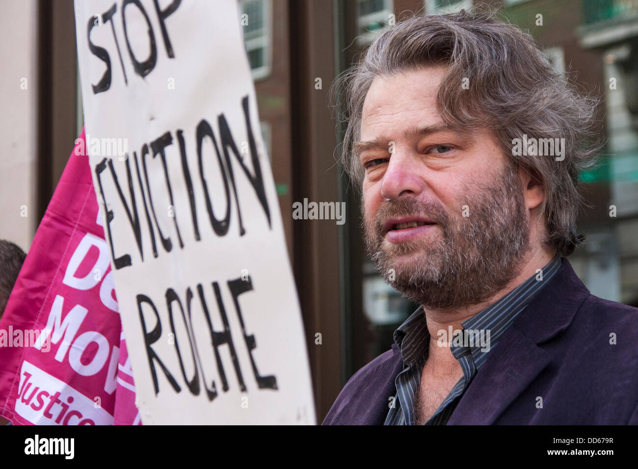 London, UK. 27th Aug, 2013. An activist outside Glencore Xastra's Mayfair offices protests against the forced eviction of villagers from Roche in Colombia to make way for the expansion of British-owned consortium Cerrejon Coal's vast open cast mine. Credit:  Paul Davey/Alamy Live News Stock Photo