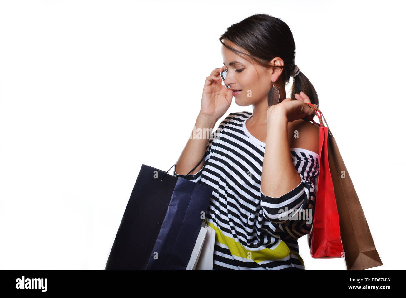 beautiful young woman with shopping bags Stock Photo