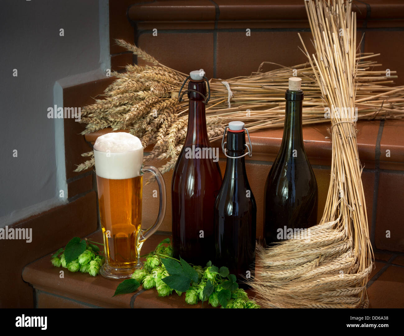 still life with bottles and raw material for beer production Stock Photo