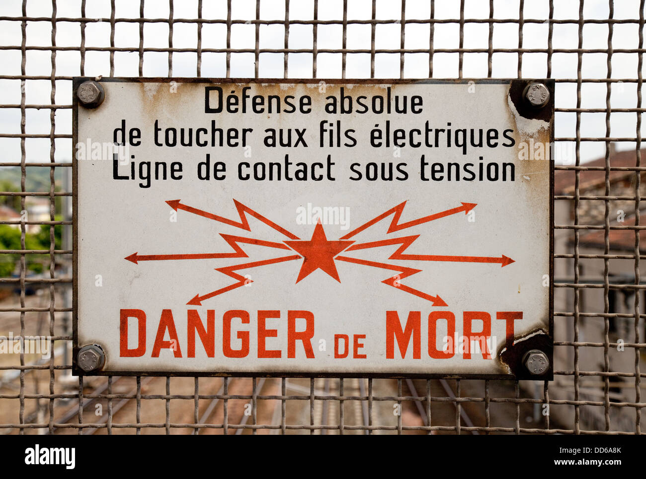 Danger of death by electrocution sign above the railway line in Agen, France, Europe Stock Photo