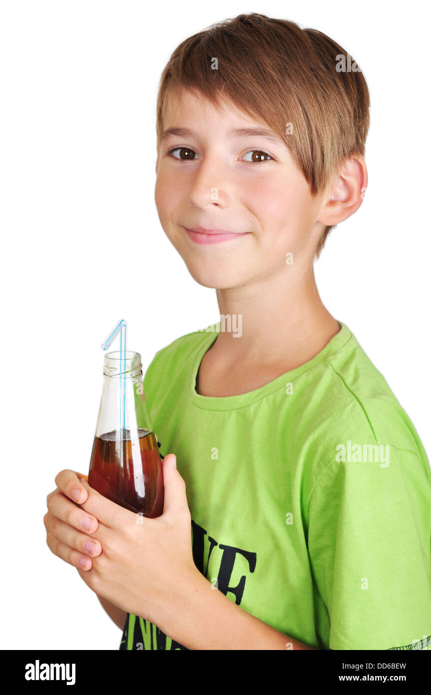 Smiling boy with bottle of juice in his hand Stock Photo Alamy