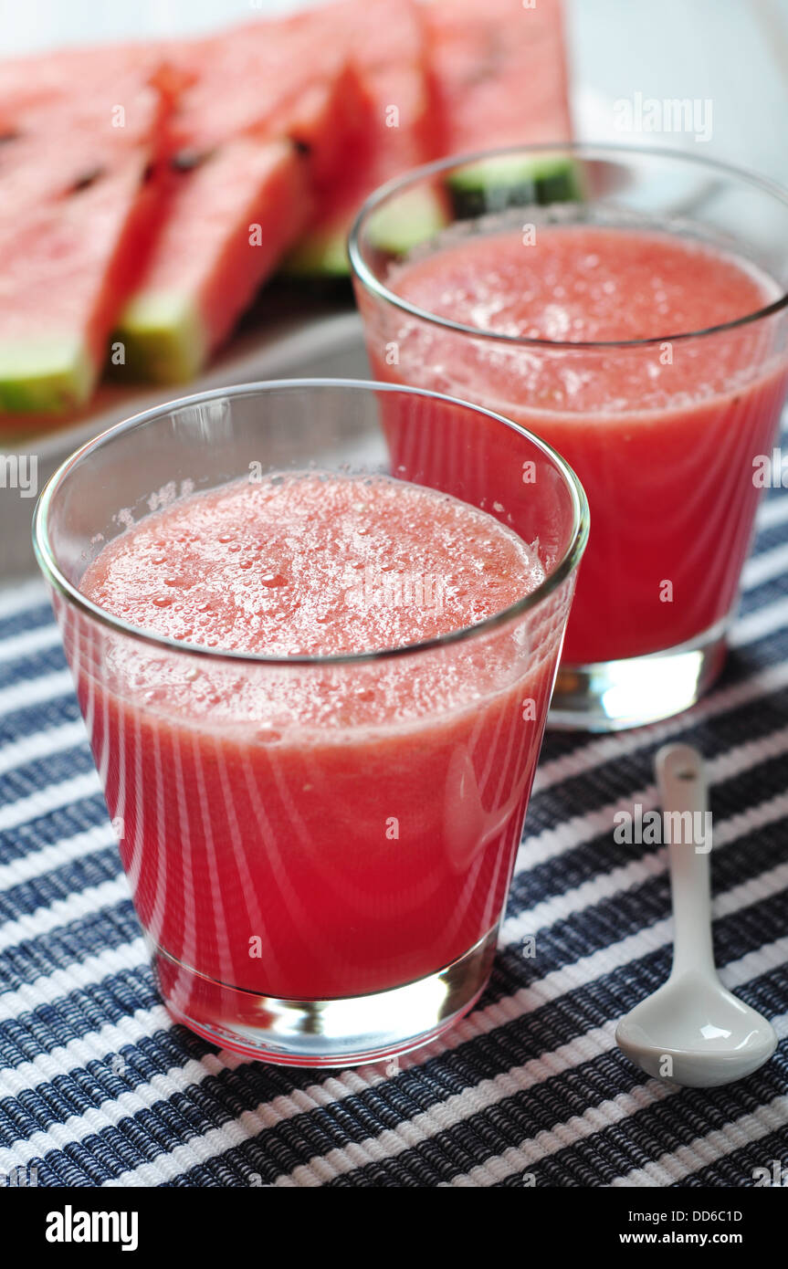 Water melon smoothie in glass with sliced water melon Stock Photo