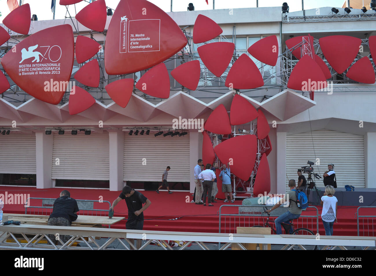 Venice, Italy. 27th Aug, 2013. Workers set up the entrance of the the Lido Casino on the eve of the opening ceremony of the 70th Venice Film Festival on August 27, 2013 at Venice Lido. Credit:  Gaetano Piazzolla/Alamy Live News Stock Photo