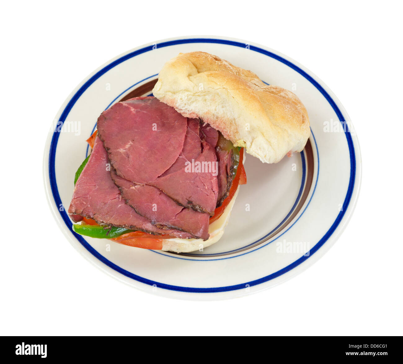 A rare roast beef sandwich with bulky roll on a plate. Stock Photo