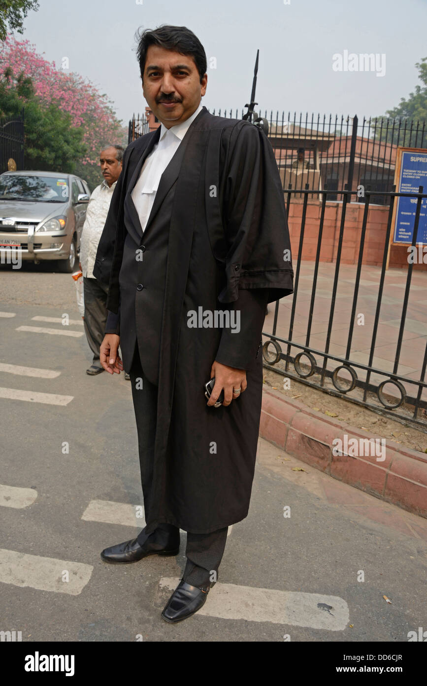 An Indian barrister at the main entrance to the Supreme Court  of India in Janak Puri, New Delhi, India Stock Photo