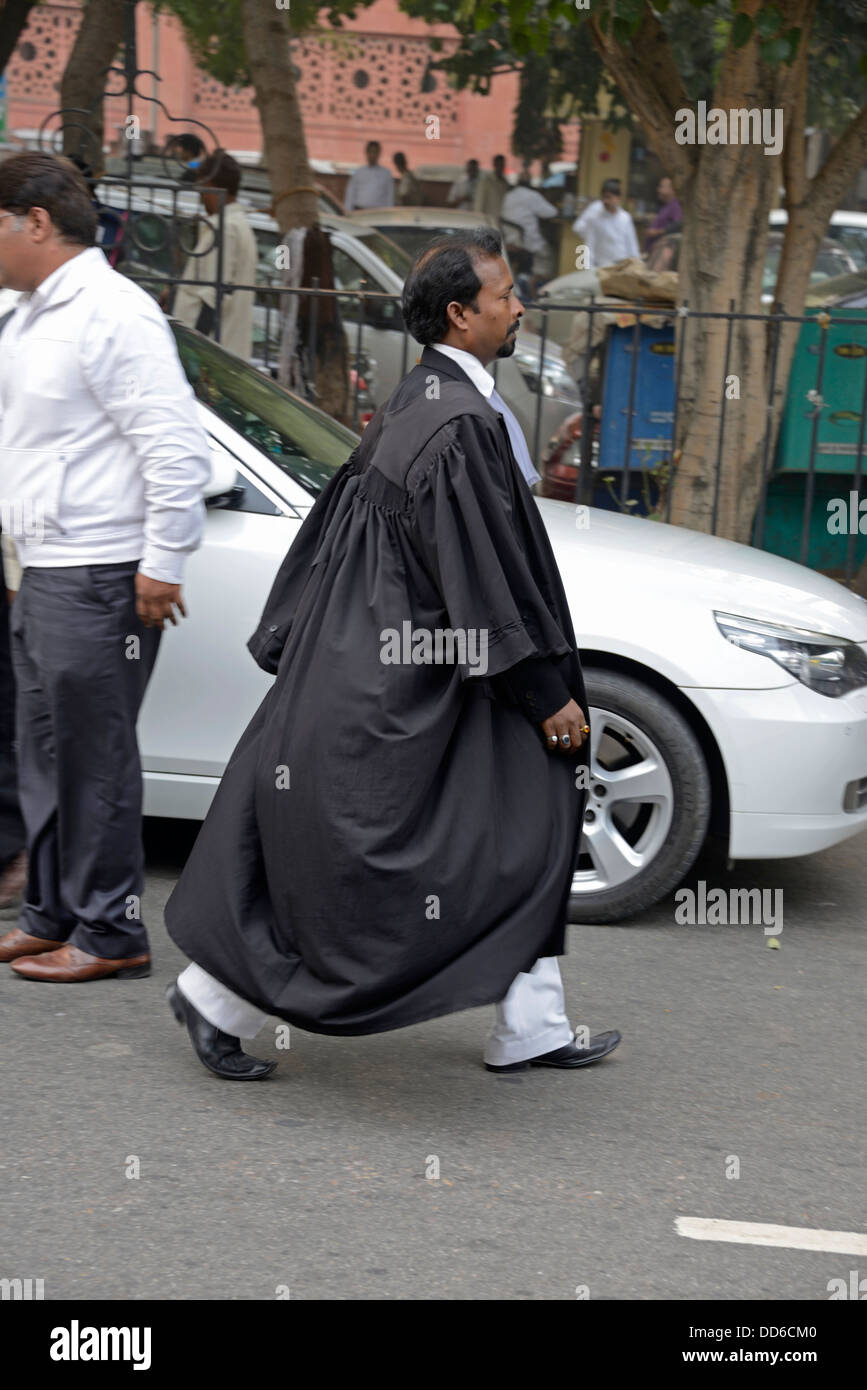 An Indian lawyer at the main entrance to the Supreme Court  of India in Janak Puri, New Delhi, India Stock Photo