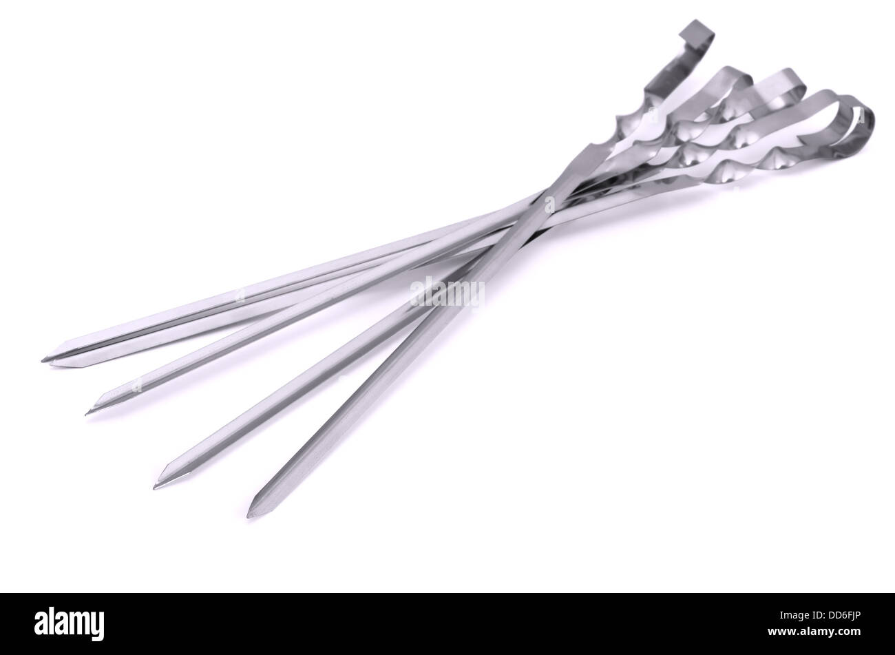 Stainless steel BBQ skewers isolated on white Stock Photo